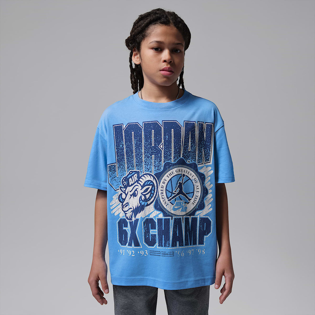 PlayeraAJ11 University Blue Retro GOAT para niños talla grande Jordan – Azul universitario – vista 1