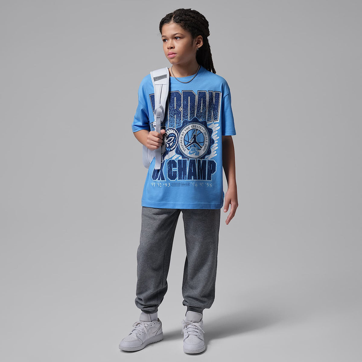 PlayeraAJ11 University Blue Retro GOAT para niños talla grande Jordan – Azul universitario – vista 5