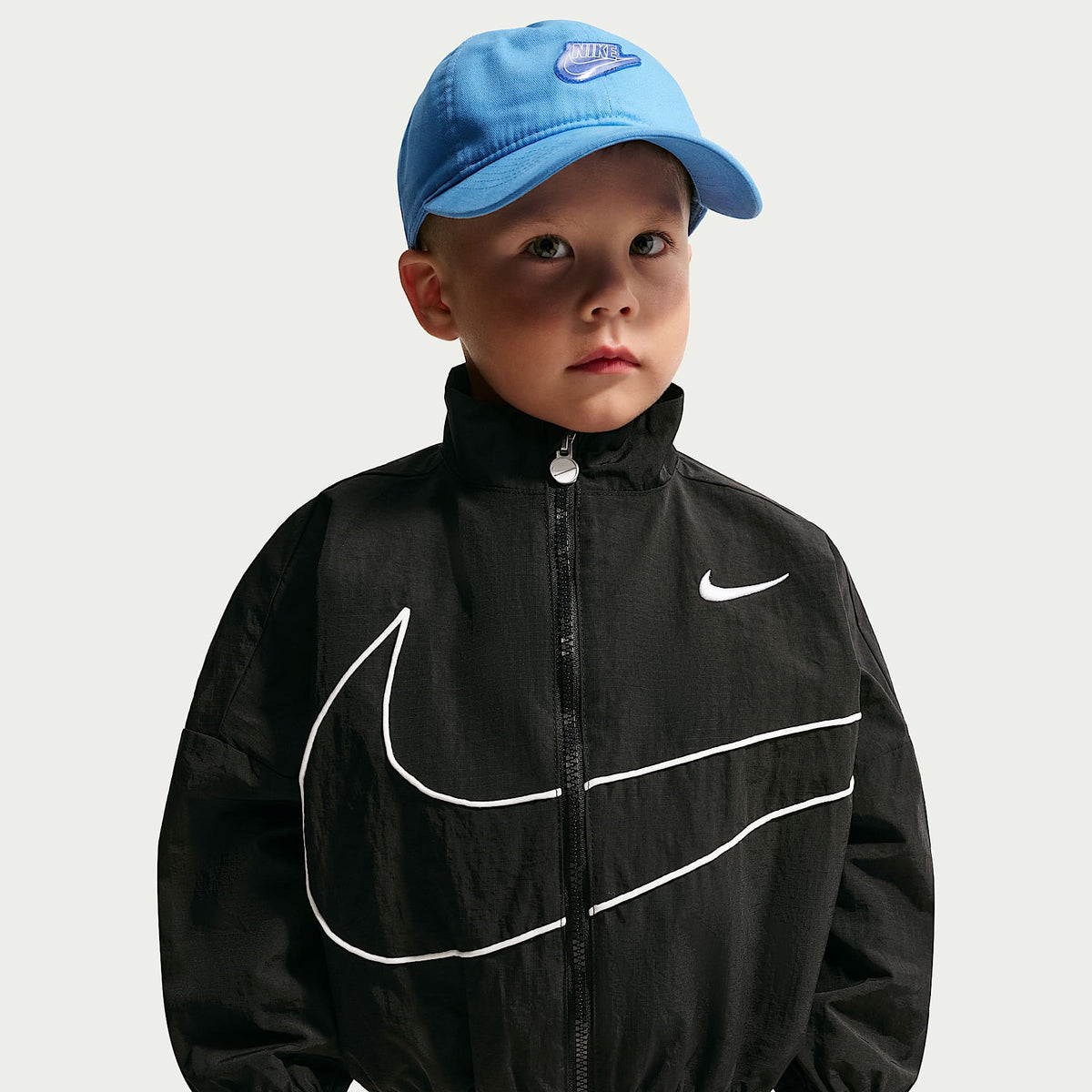 Chamarra cortavientos Swoosh Big sin capucha infantil Nike – Negro – vista 1