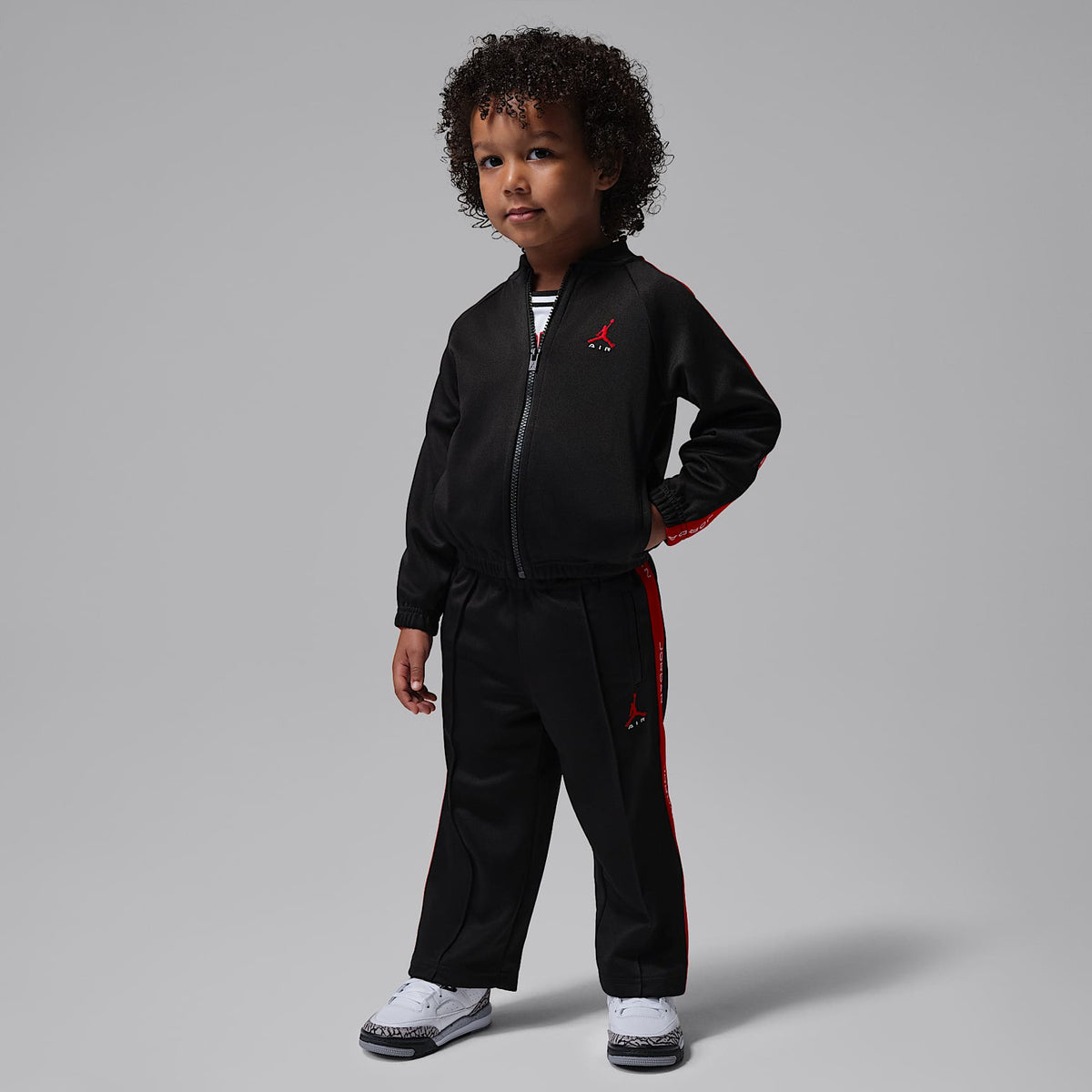 Conjunto deportivo de 2 piezas Dri-FIT infantil Jordan Brooklyn Essentials – Negro – vista 1