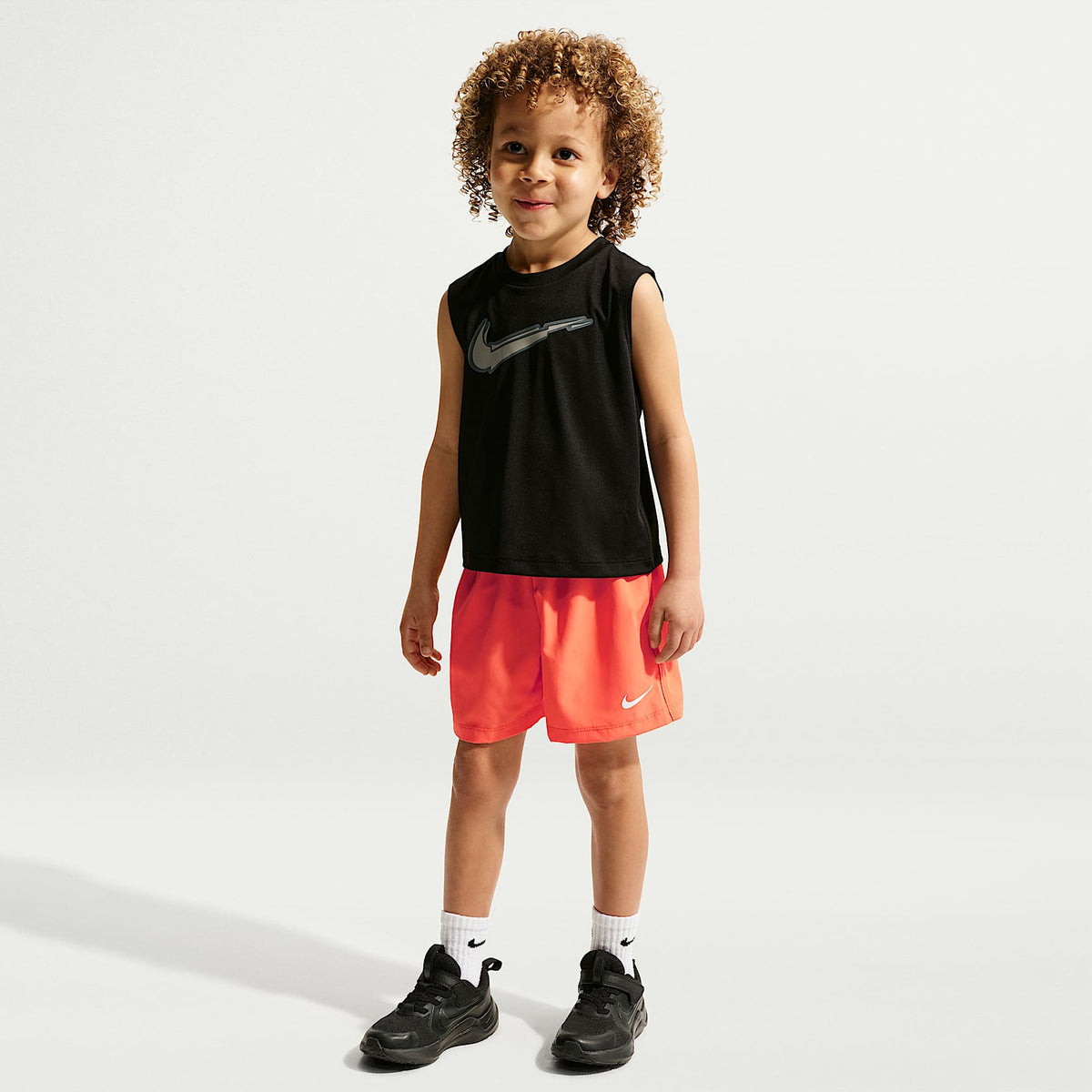Shorts Dri-FIT Icon de tejido Woven infantil Nike – Naranja césped – vista 1