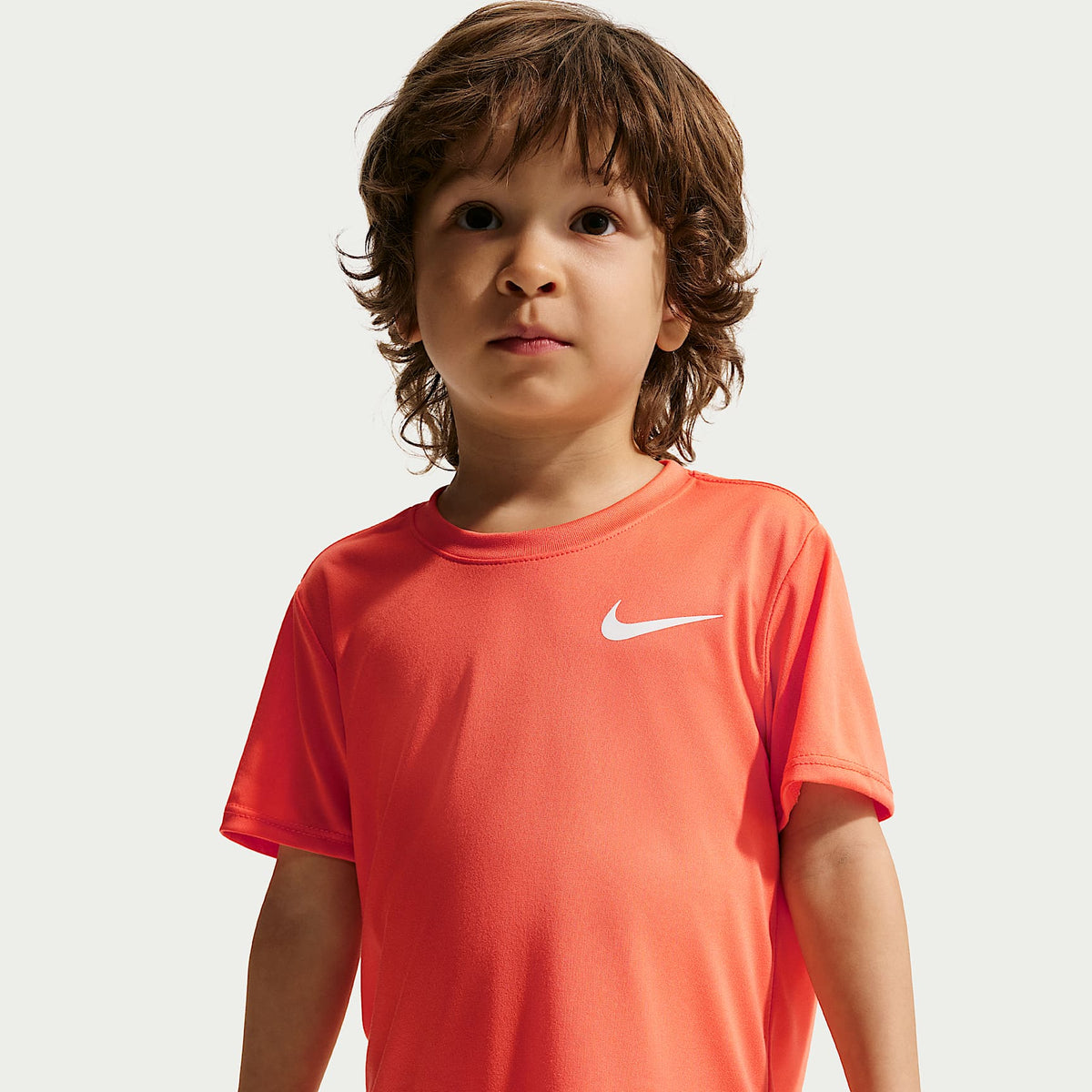 Playera Legend Dri-FIT para niños talla pequeña Nike – Naranja césped – vista 1