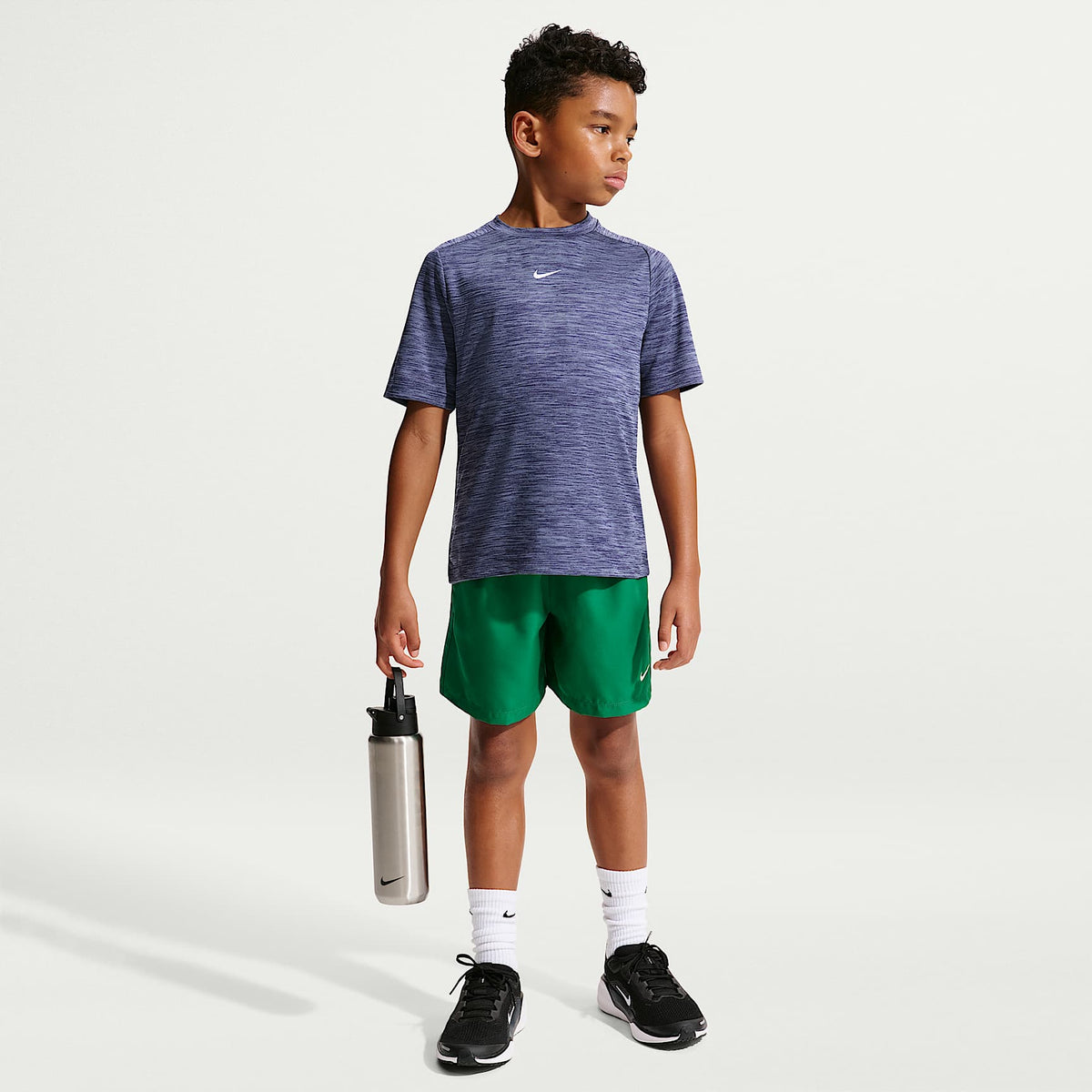Shorts Dri-FIT de tejido Woven para niño talla grande Nike Multi – Malaquita/Blanco – vista 1