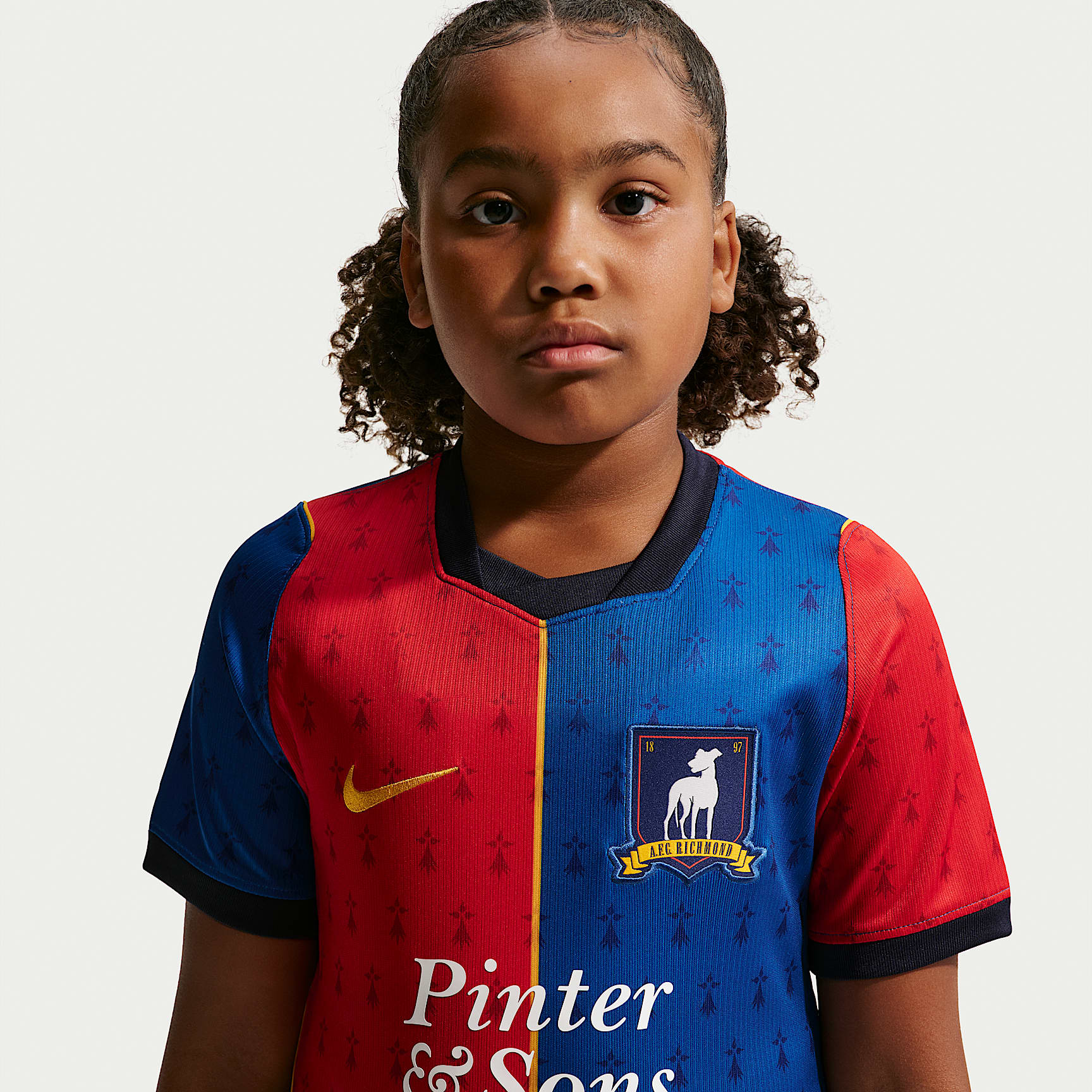 Jersey de futbol Nike Dri-FIT Replica del AFC Richmond local 2026 Stadium para niños talla grande – Royal team/Rojo universitario/Atardecer – vista 2