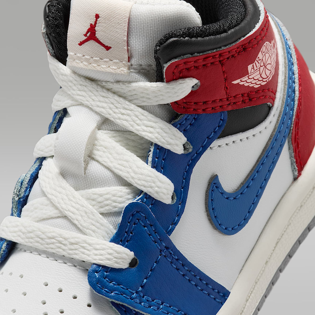 Jordan 1 Mid – Azul genuino/Rojo universitario/Negro/Blanco cumbre – vista 7