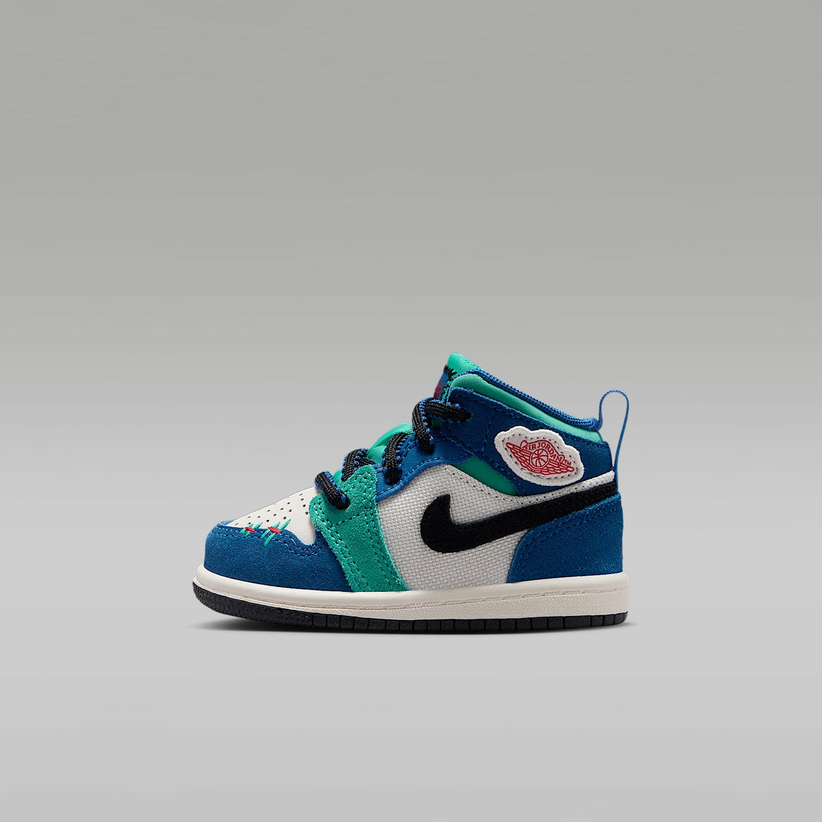 Jordan 1 Mid SE – Tiza/Azul genuino/Verde cinético/Rojo universitario – vista 1