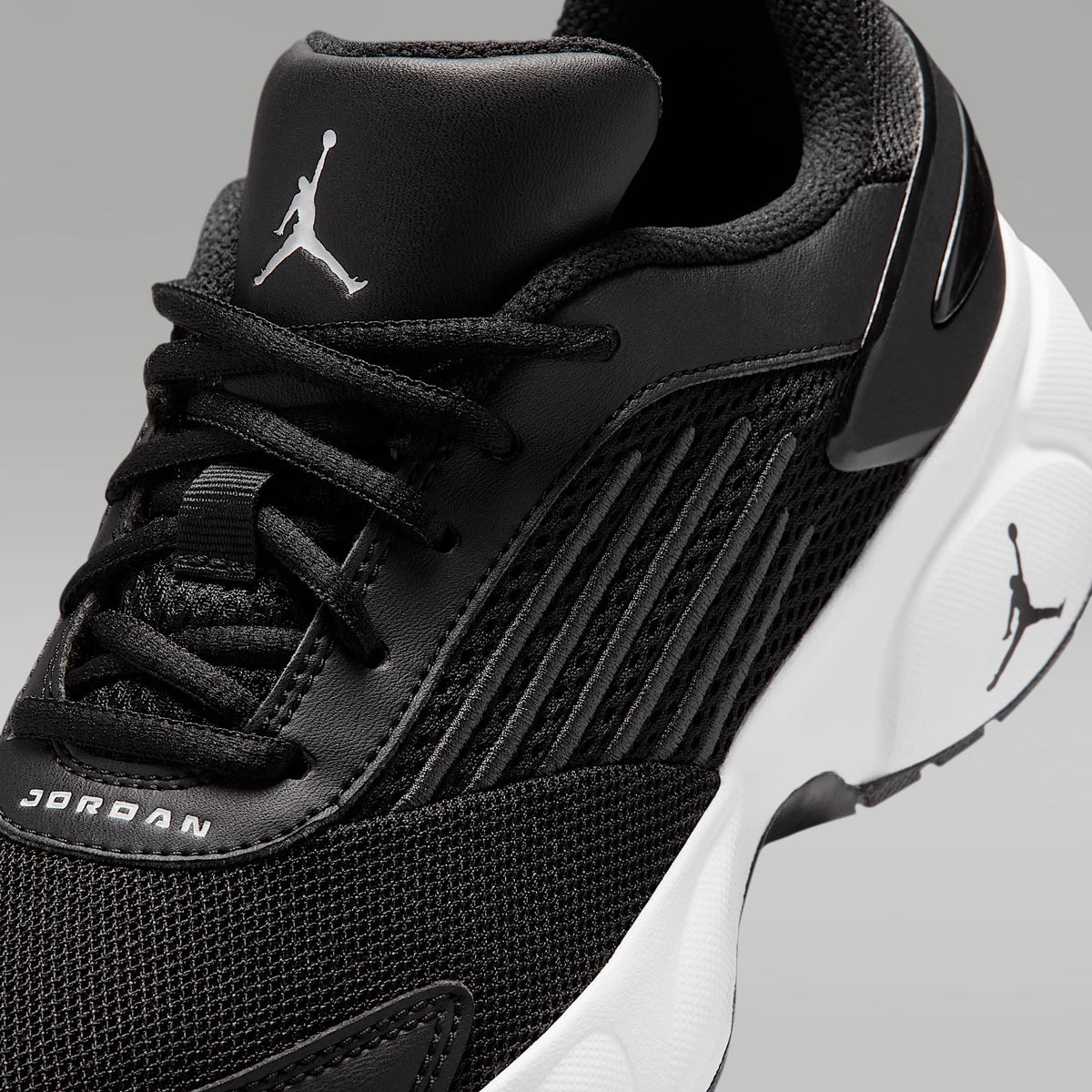 Jordan Trunner Flow – Negro/Antracita/Blanco – vista 7