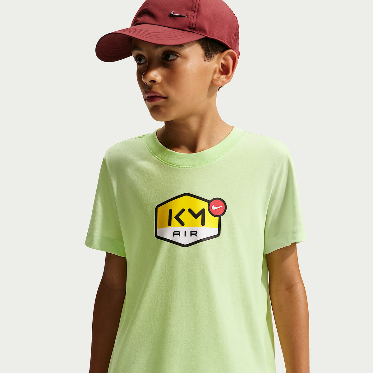 Playera Dri-FIT para niños talla grande Kylian Mbappé – Lima líquida claro – vista 1