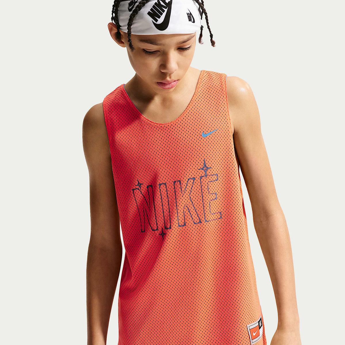 Jersey de básquetbol Dri-FIT para niños talla grande Nike Sportswear – Naranja césped/Estrella azul/Estrella azul – vista 1