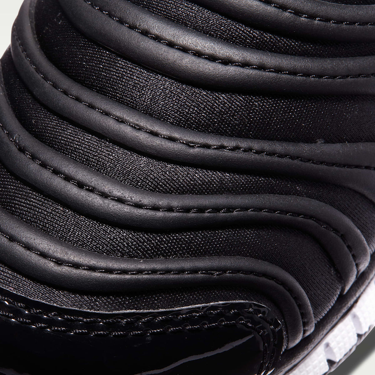 Nike Dynamo Free – Antracita/Negro/Blanco – vista 7