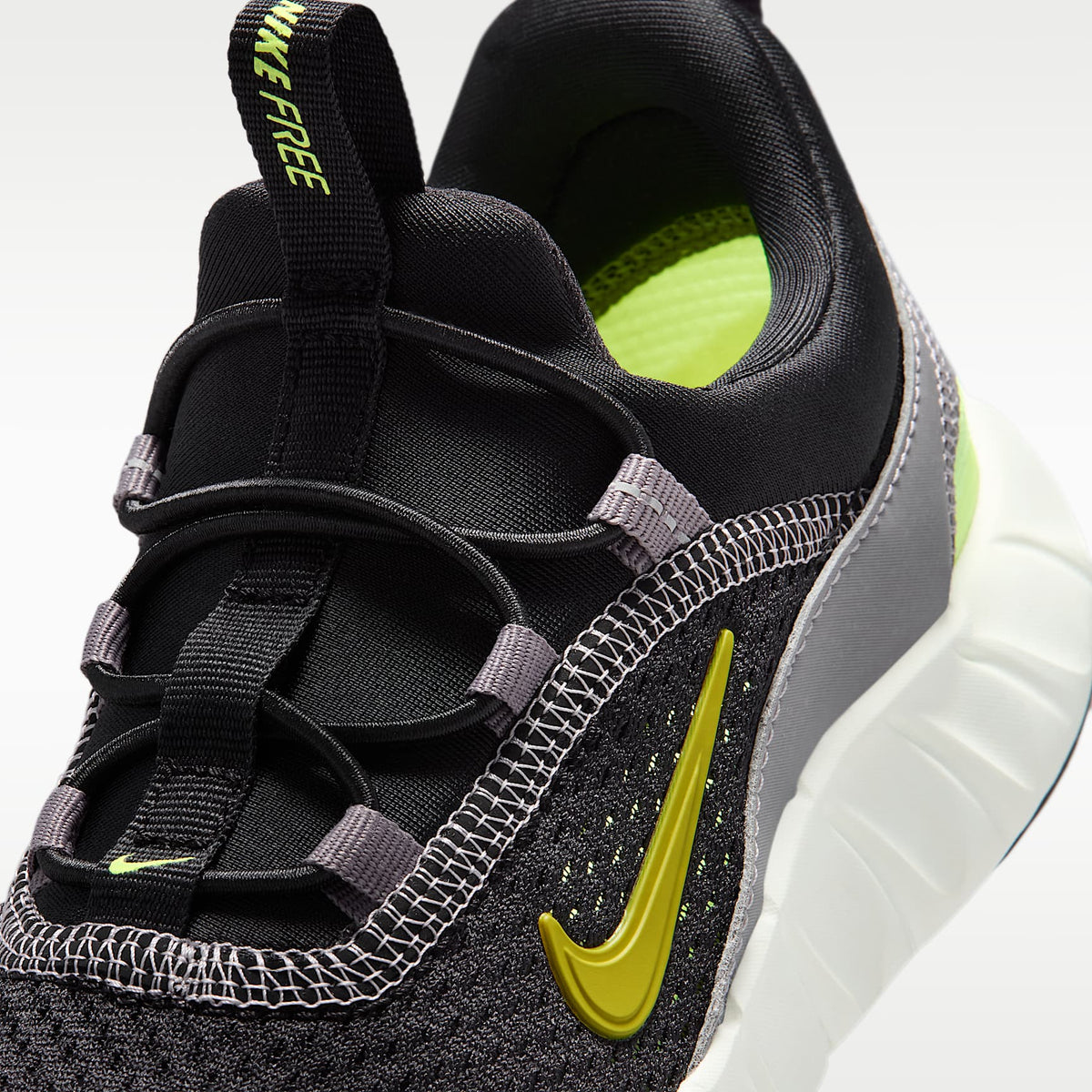 Nike Free Ride – Negro/Punta de Lápiz/Hielo volt/Cuarzo azafrán – vista 7