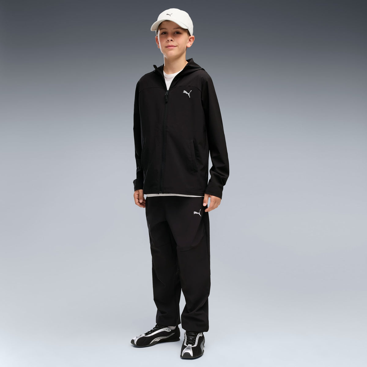 Pantalón juvenil tejido elástico en 4 direcciones PUMATECH – PUMA BLACK – vista 1