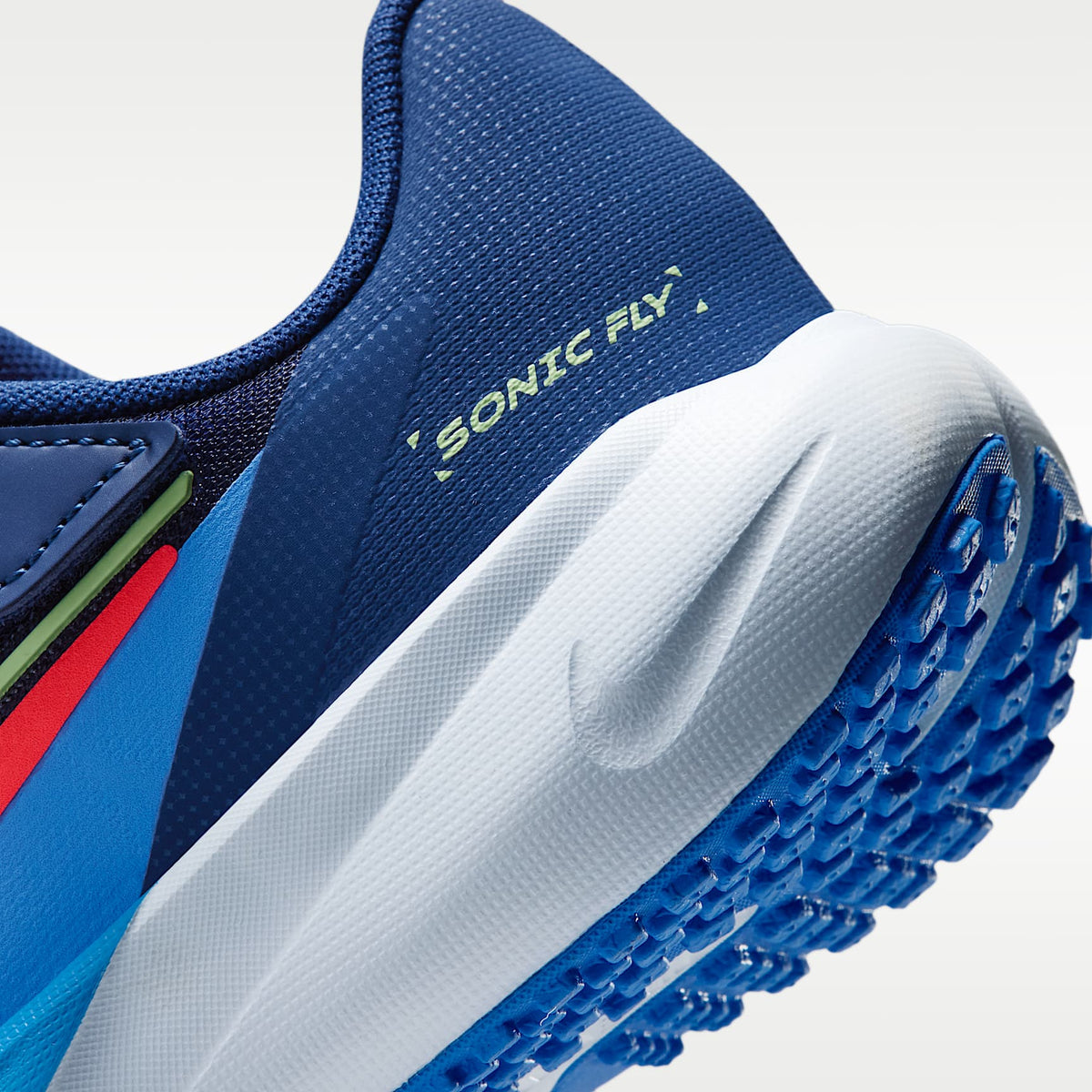 Nike Sonic Fly – Azul marino medianoche/Azul cristal/Tinte azul/Lava cálido – vista 8