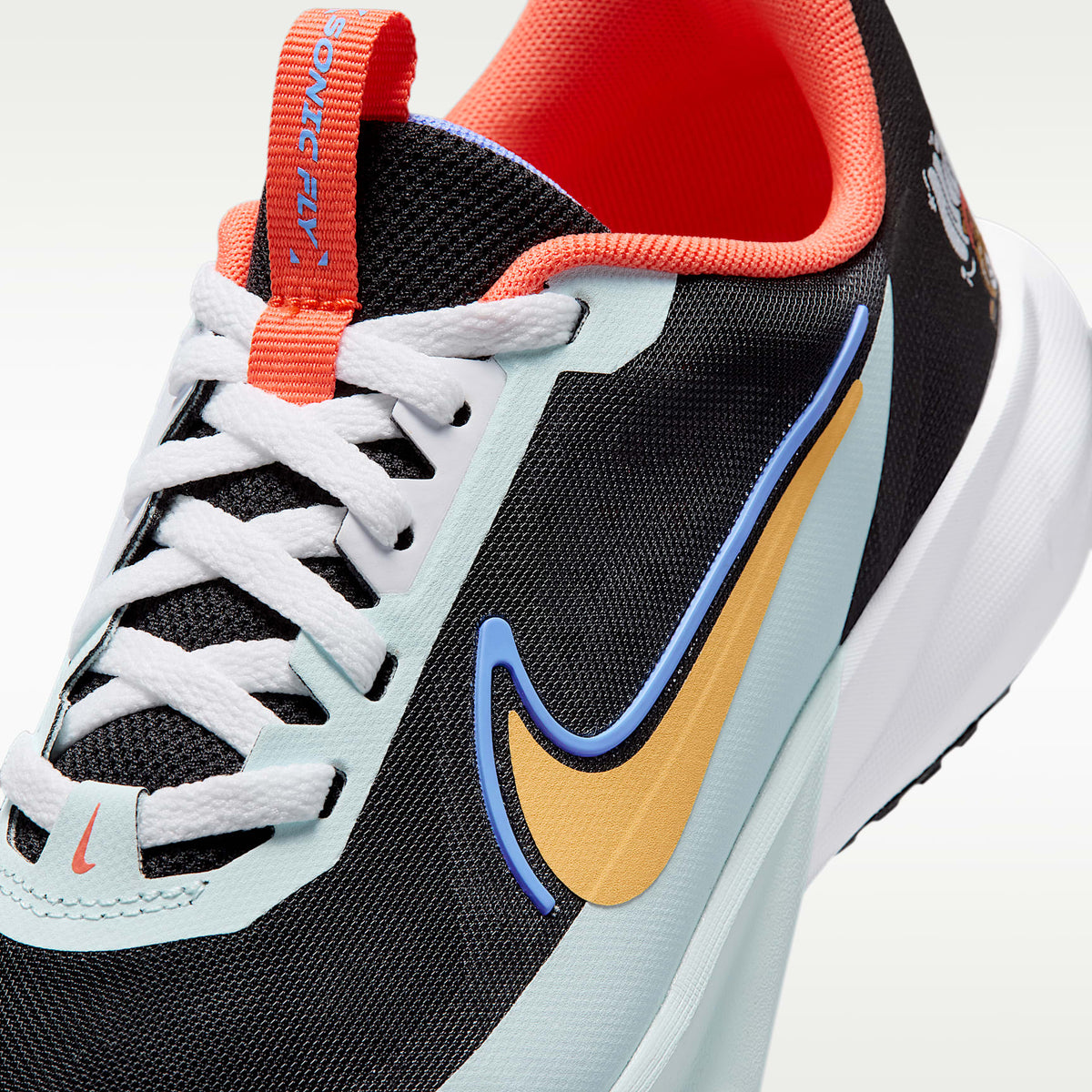 Nike Sonic Fly – Negro/Blanco/Azul glacial/Oro topacio – vista 7