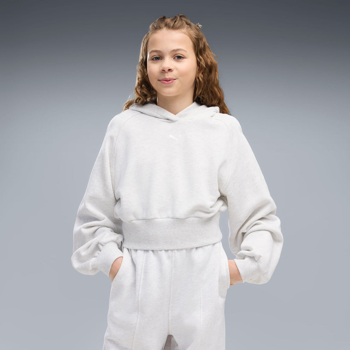 Sudadera con capucha recortada y mangas abombadas juvenil PUMA Essentials – White Glow Heather – vista 1