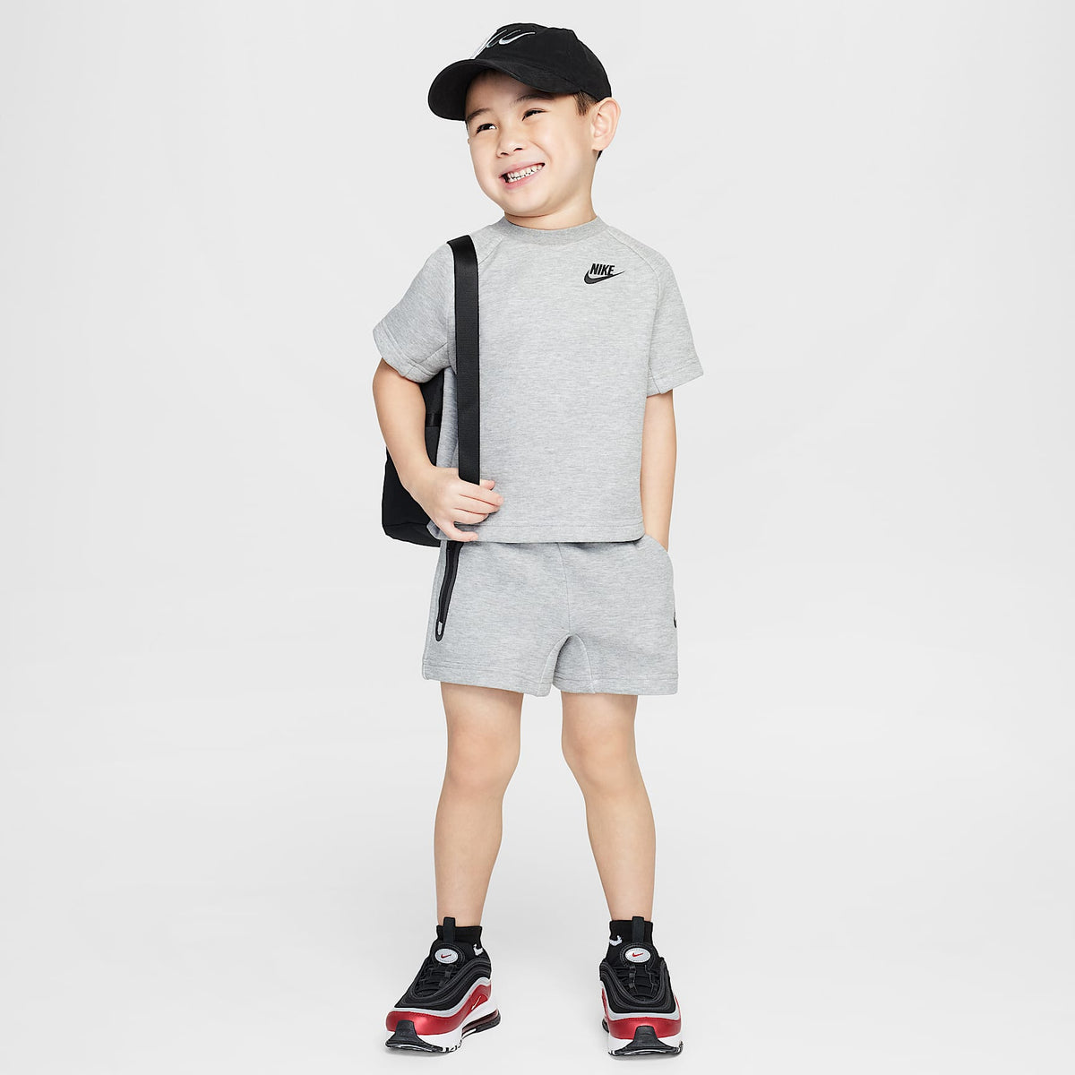 Conjunto de playera y shorts de Tech Fleece infantil Nike – Gris oscuro jaspeado – vista 1