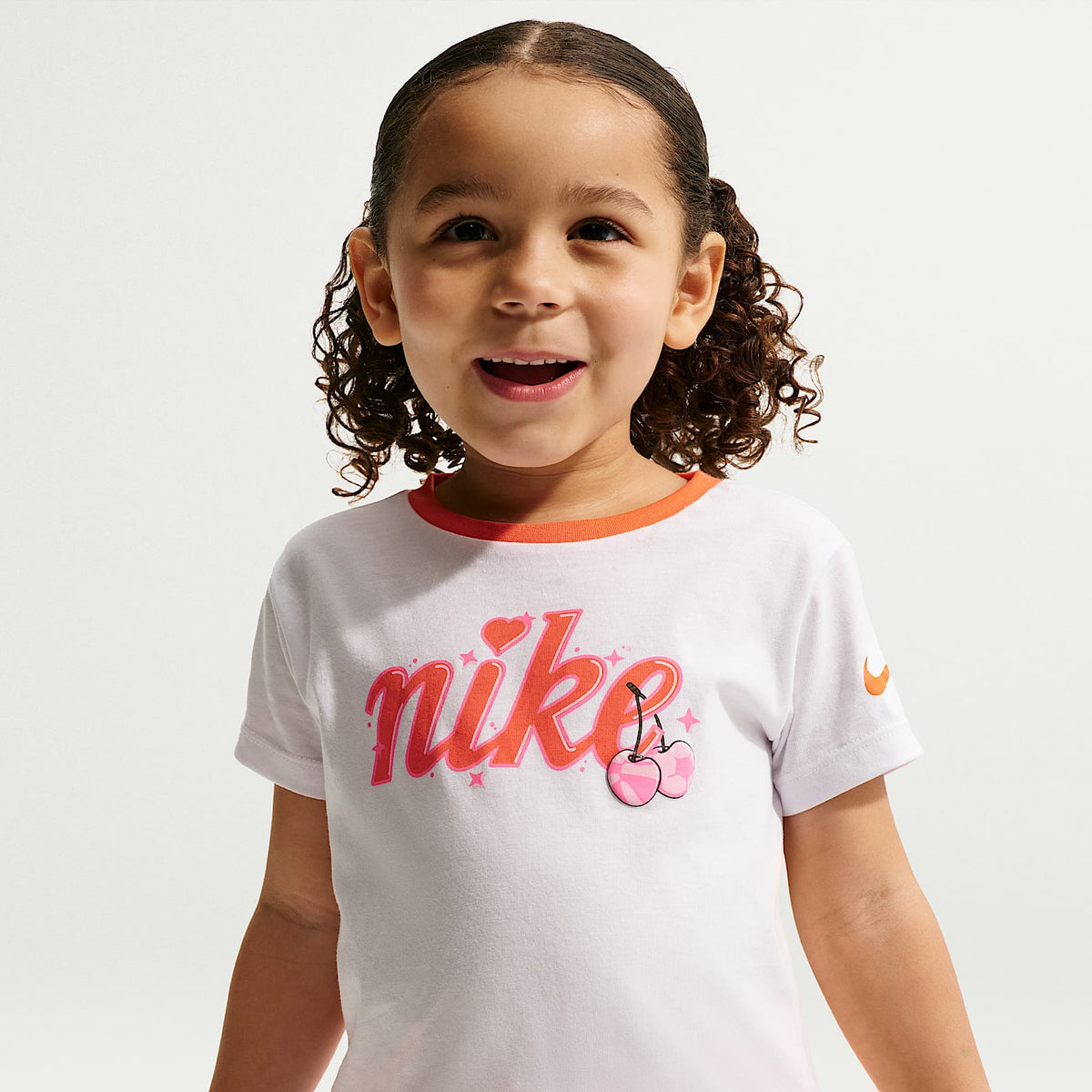 Conjunto de playera y shorts cruzados Dri-FIT infantil Nike – Naranja césped – vista 2