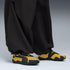 4 Colores, Tenis juveniles Mostro OG Prime – Pelé Yellow-PUMA Black – vista 2
