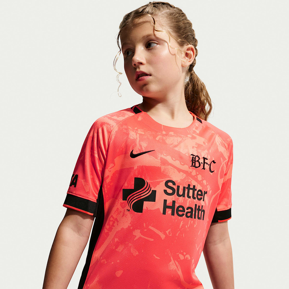 Jersey Nike Dri-FIT de la NWSL Replica para niños talla grande Bay FC Stadium Away – Coral enérgico – vista 1